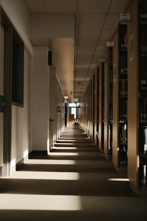 Long sunlit hallway in a modern library, similar to the new media center at Von Tobel Middle School