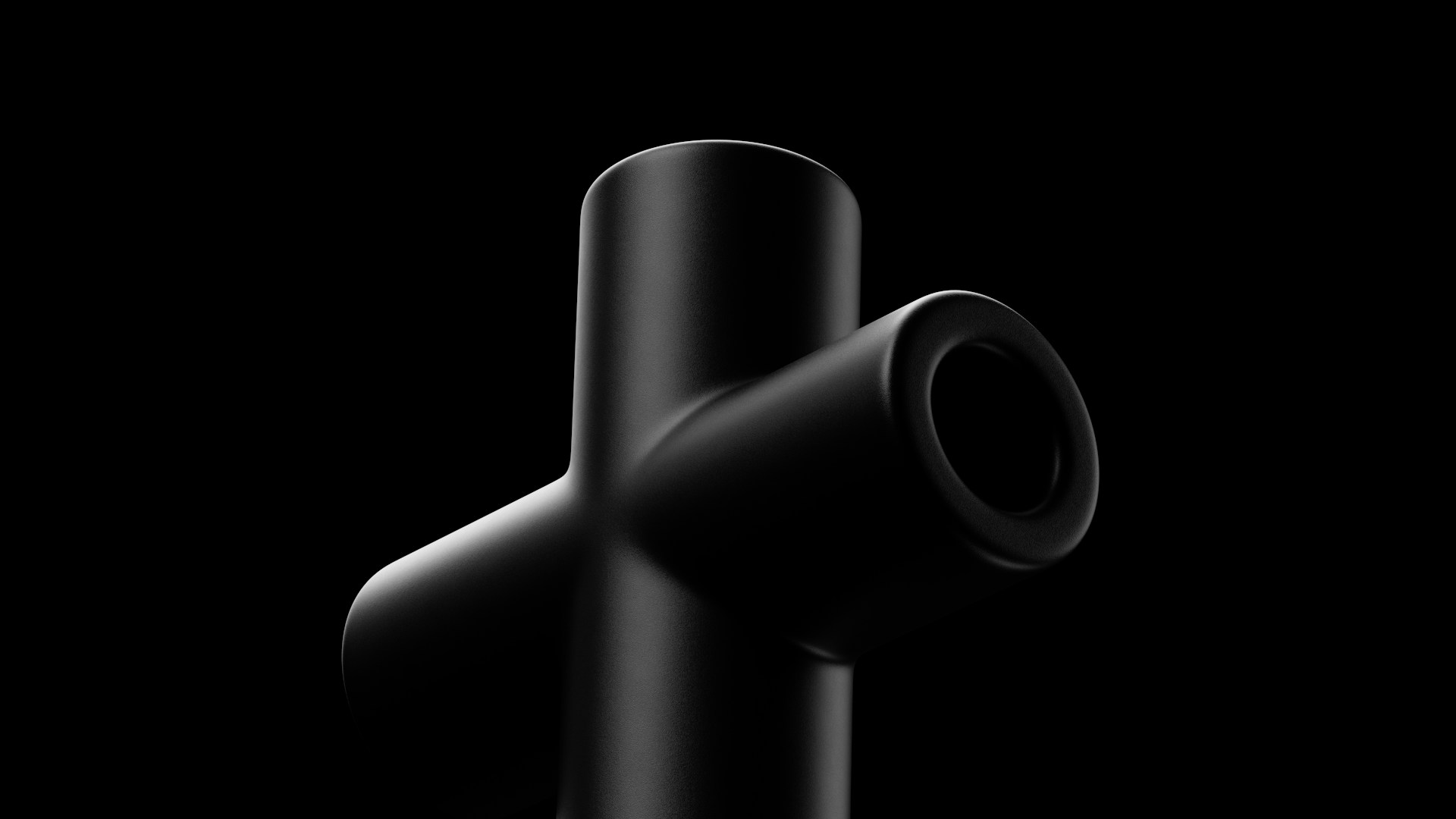 A black pipe with t-shaped angles.