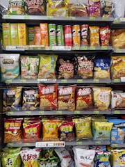Shelves are stocked with various types of chips.