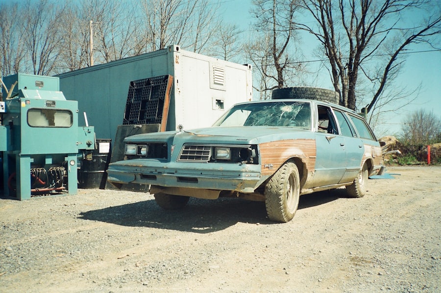 Battered car in a junkyard ready for cash for cars pickup in Calgary