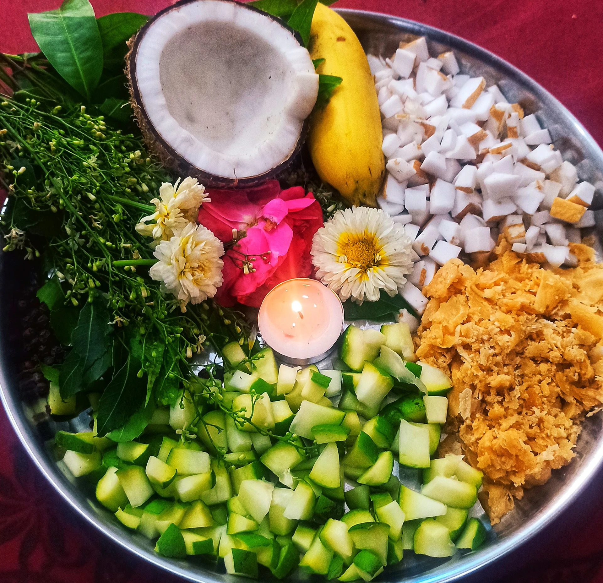 A pooja thali with various auspicious items.