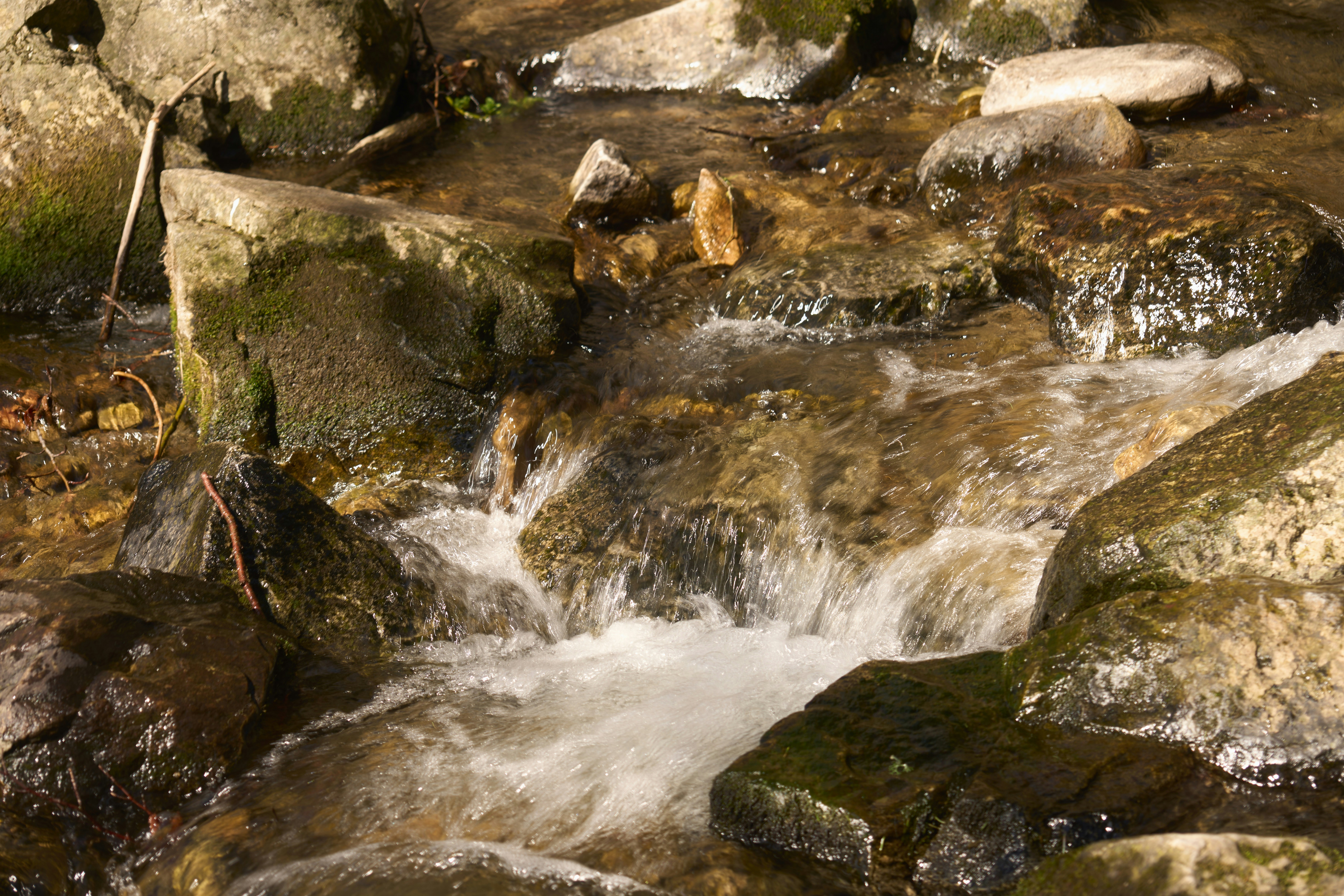 Clean, flowing stream symbolizing detoxification - IV hydration benefits