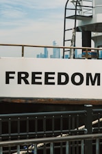 The word "freedom" is seen on a ferry.