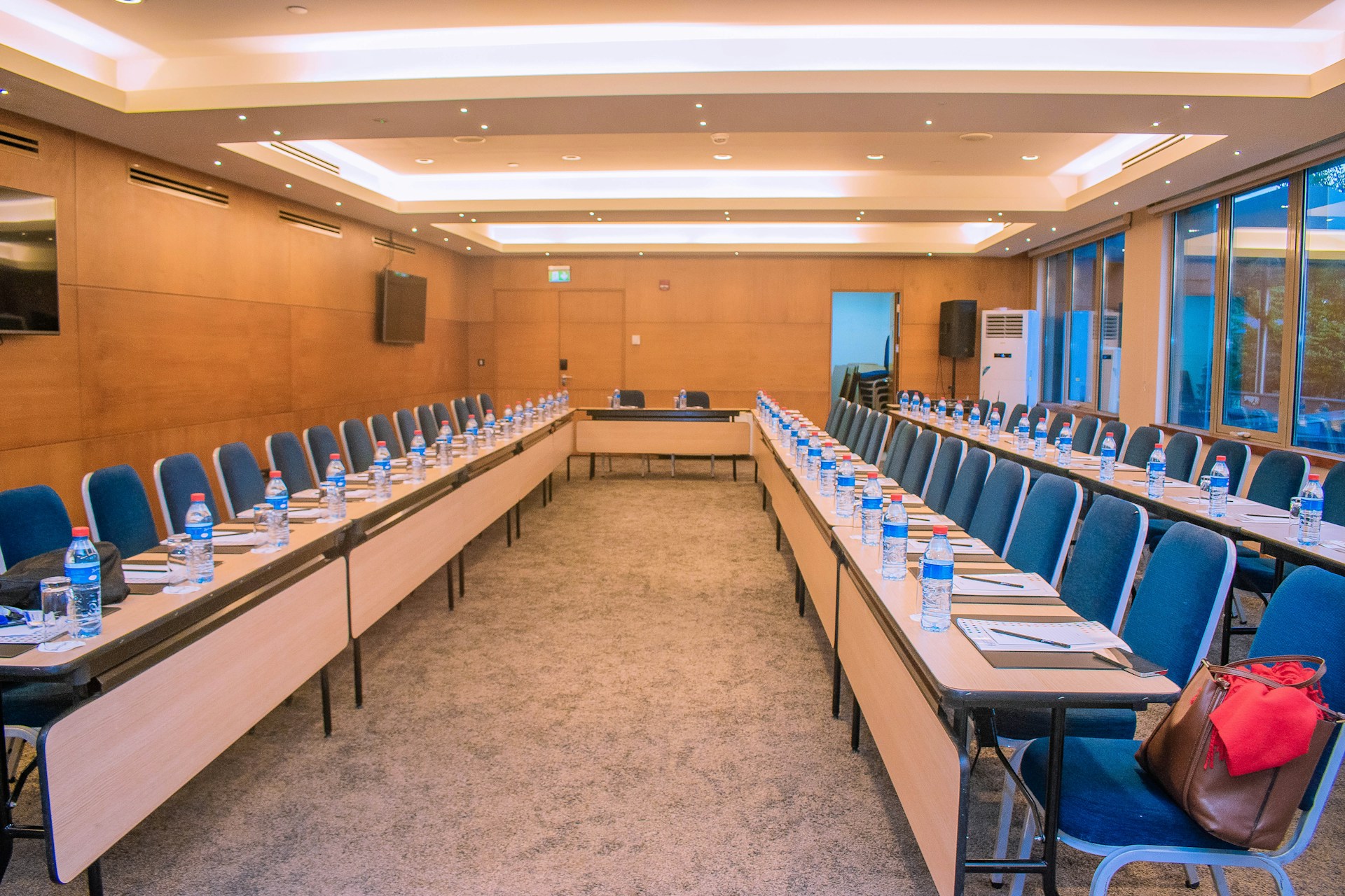 An empty conference room is ready for a meeting.