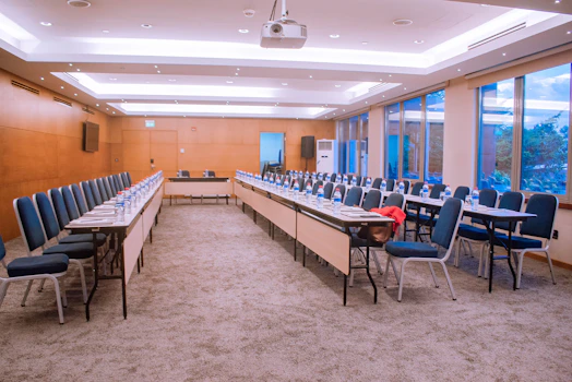 An empty conference room is ready for a meeting.