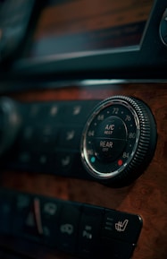 Car's climate control dials.