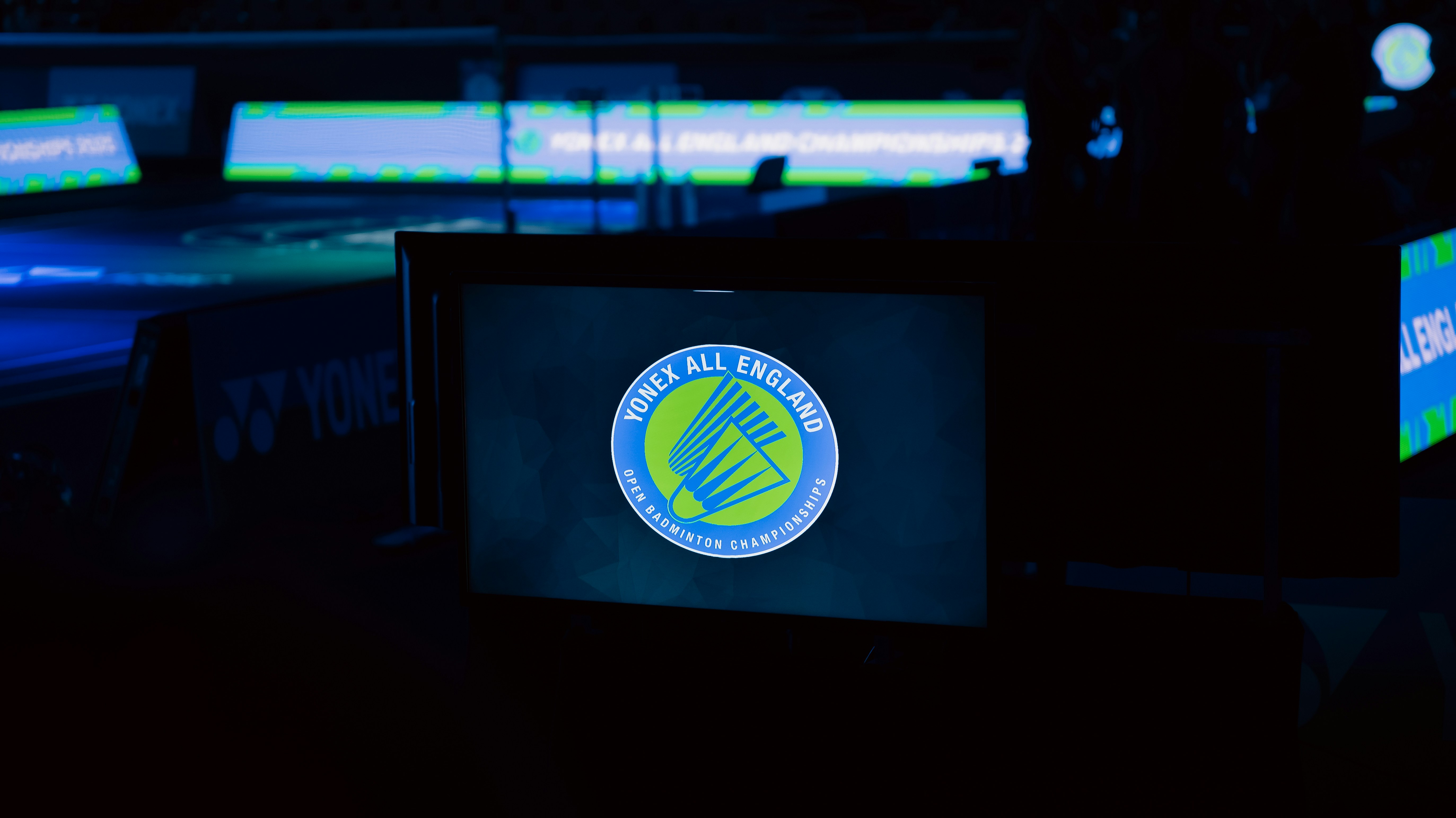 Dark arena with logo display