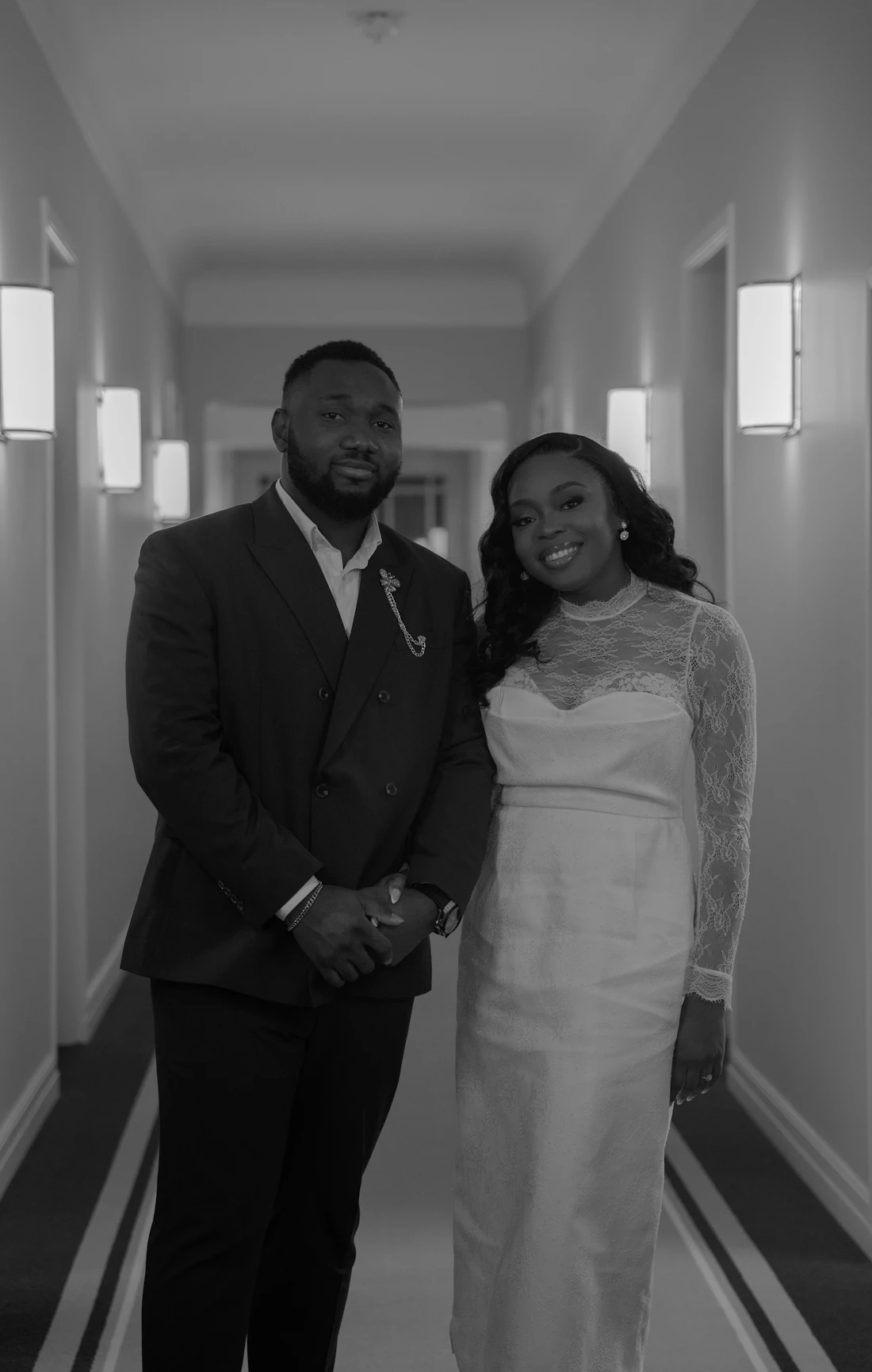 Wedding couple in an editorial hallway portrait