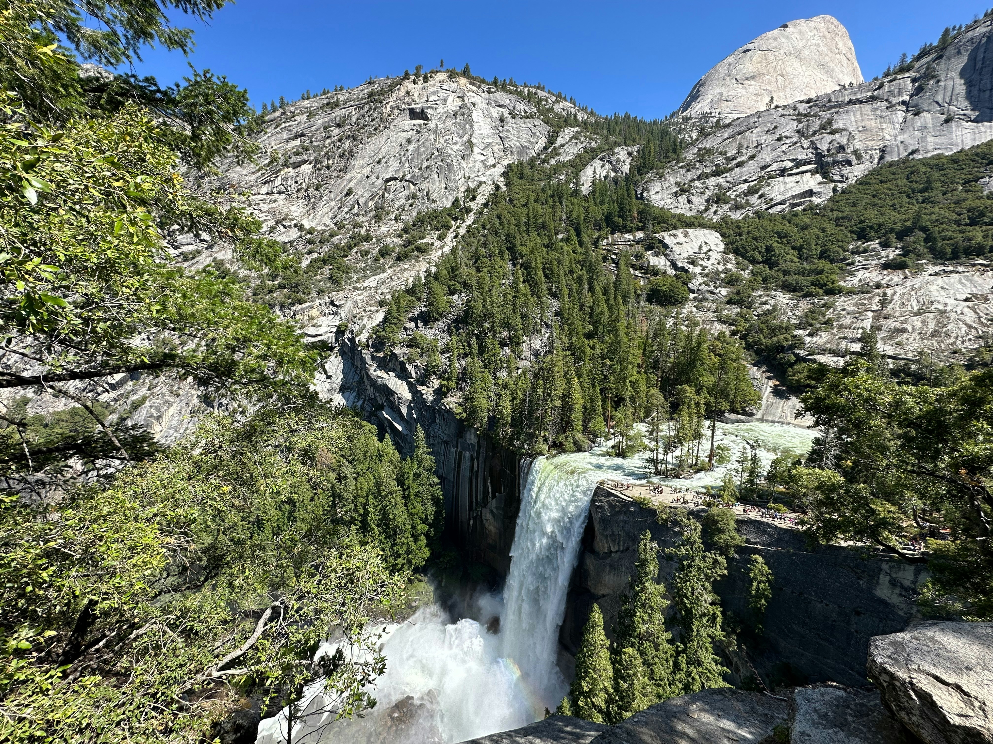 Waterfall cascades down a rocky mountain.
