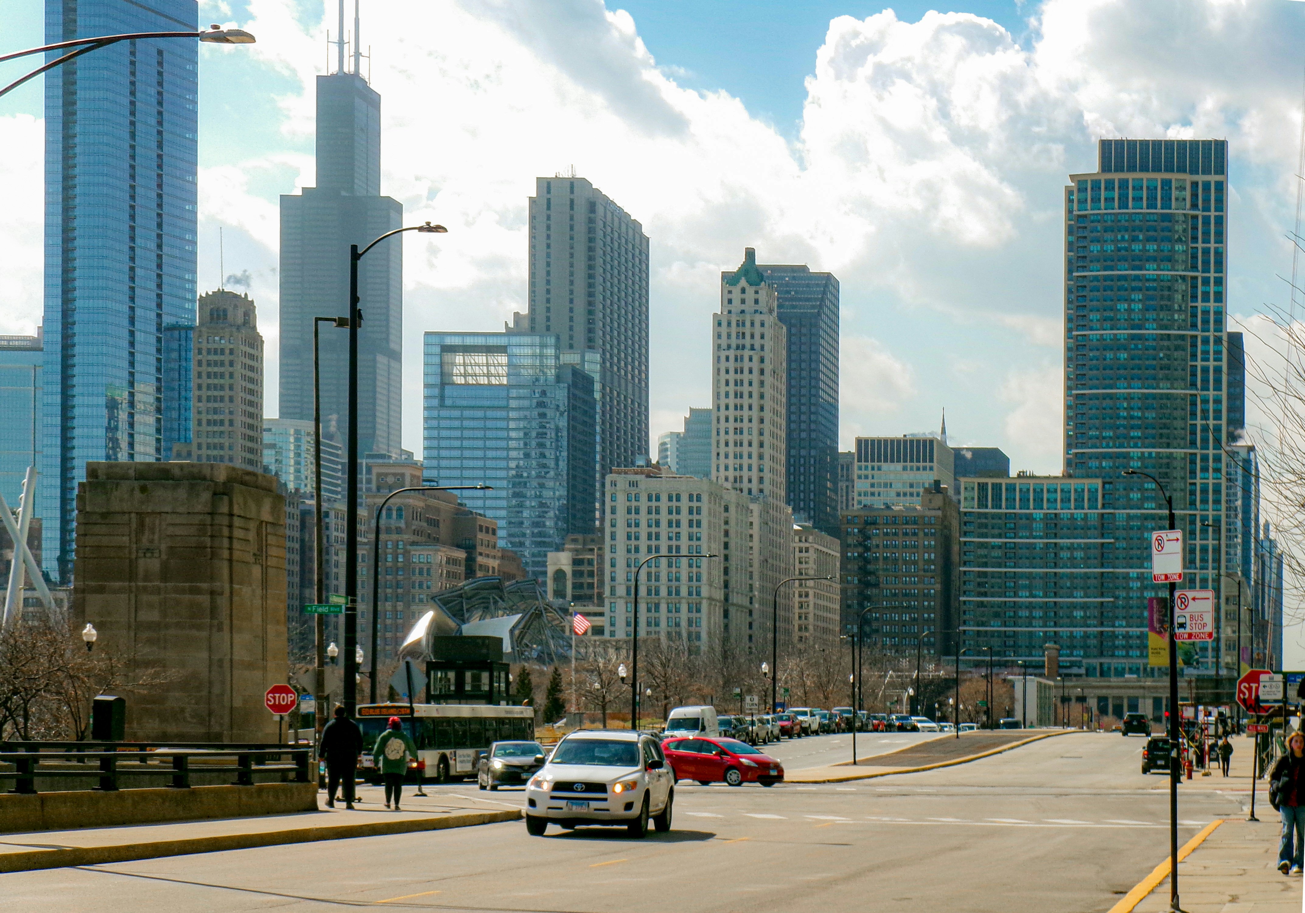 A busy Chicago street in a popular neighborhood near the lakefront. - how much is a high rise apartment in chicago