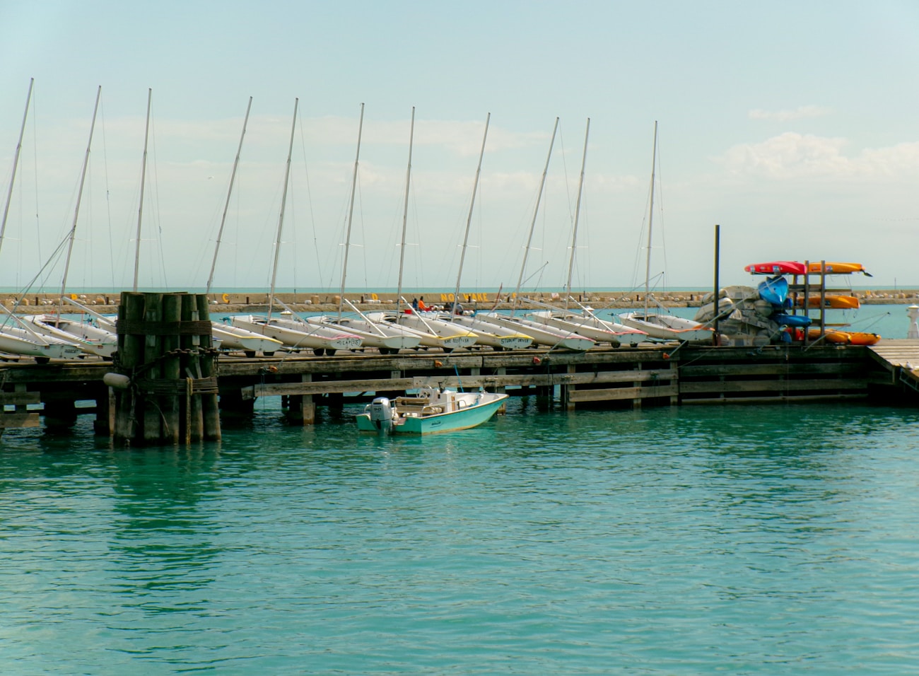 Boats docked at a serene harbor shot on Kodak PIXPRO FZ55