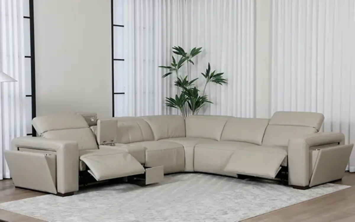 Beige power-recliner sectional with footrests extended