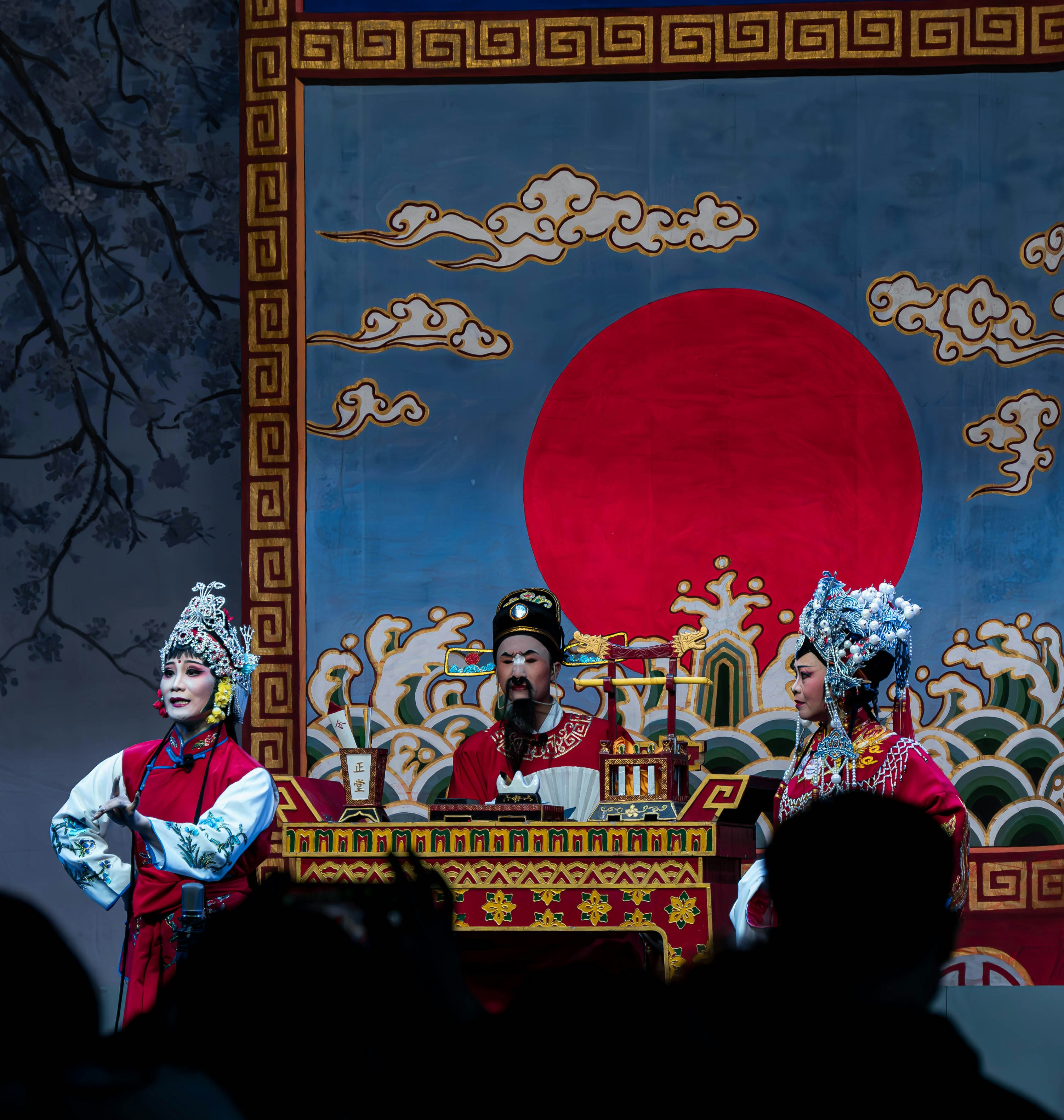 Chinese opera performers are on stage.