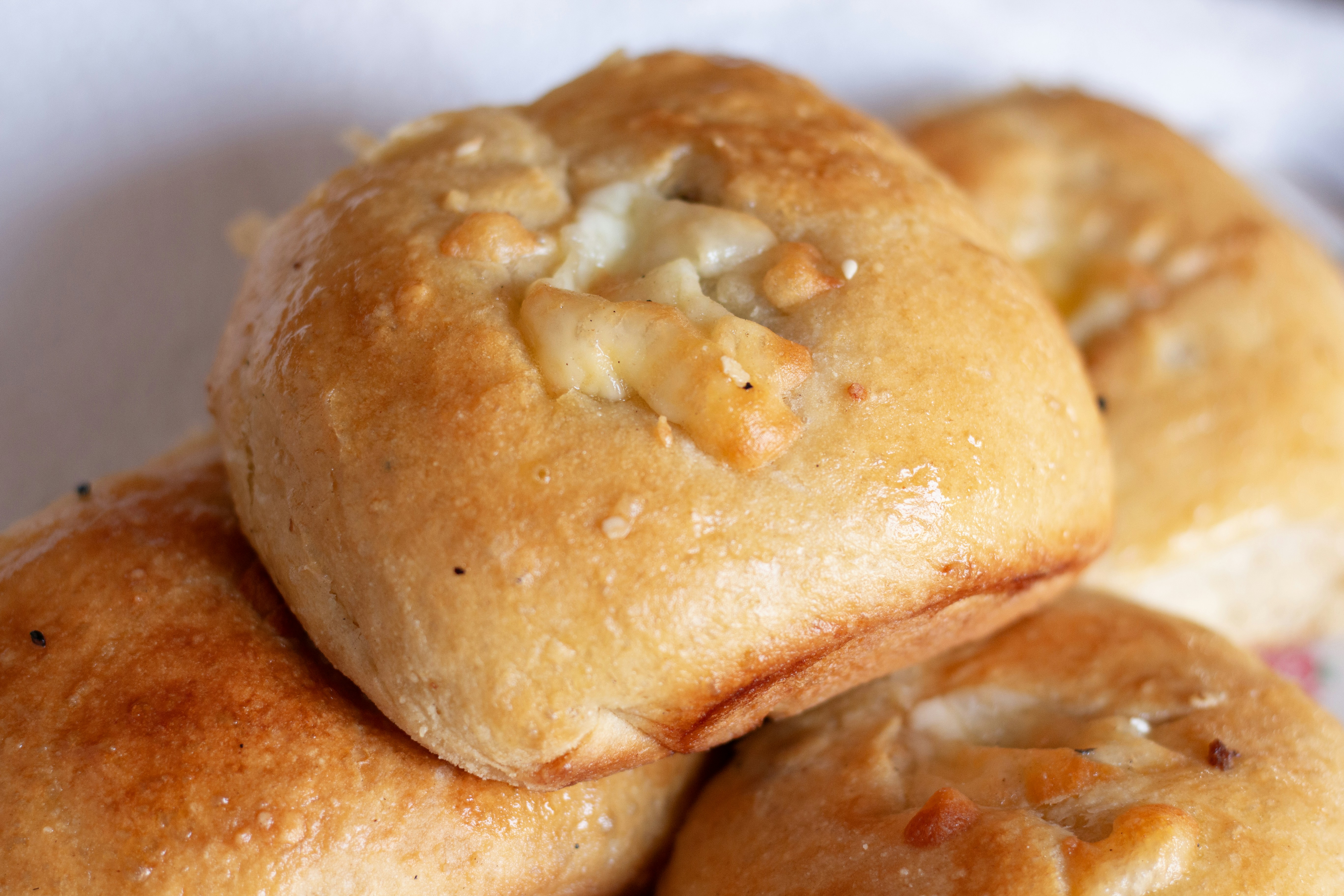 Golden garlic knots stacked and ready to eat.