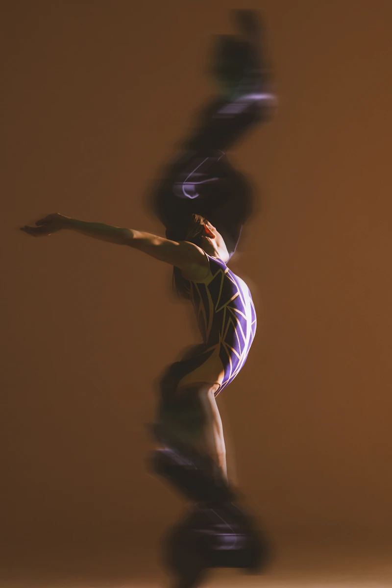 Young gymnast captured mid-movement