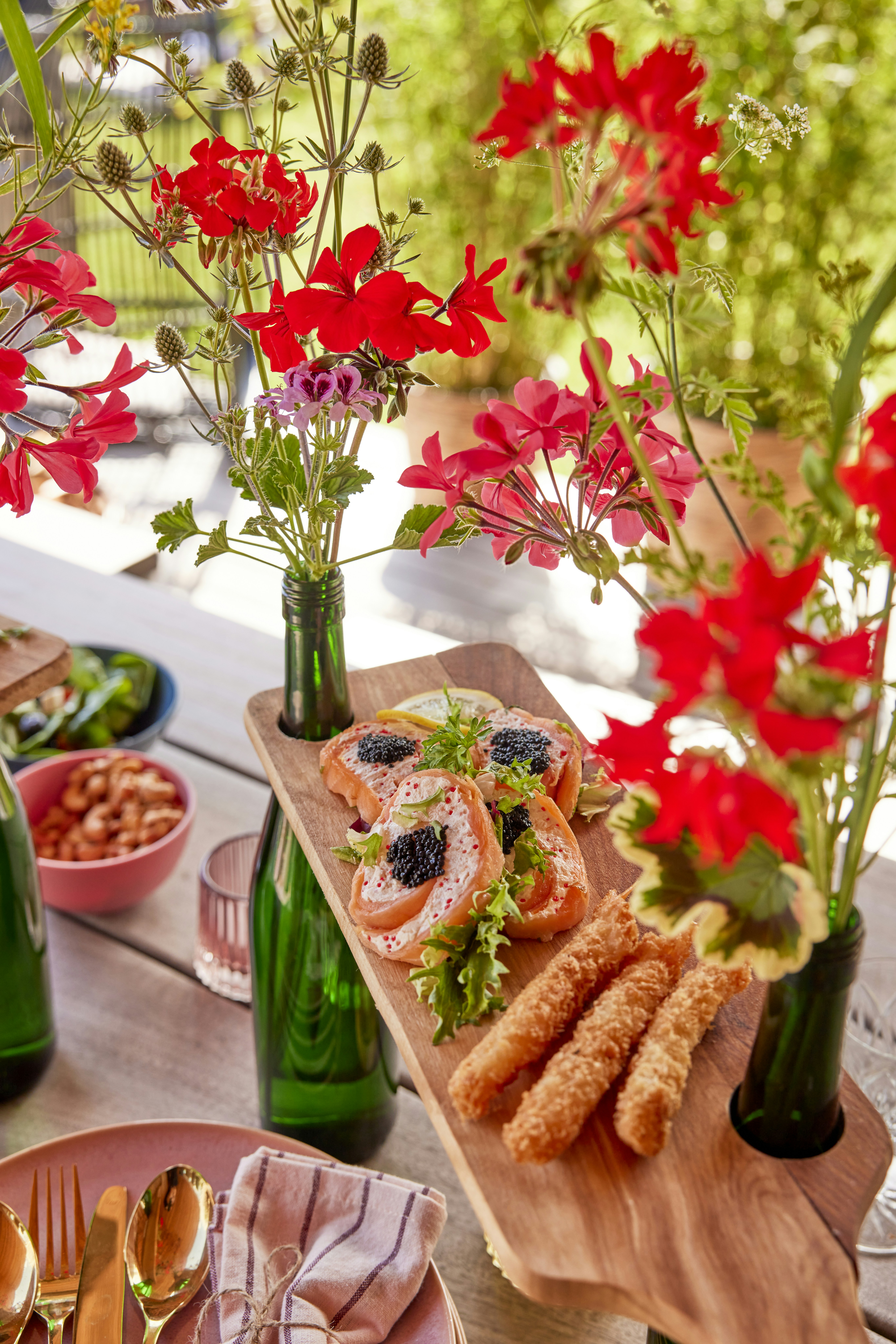 Food is served on a table decorated with flowers.