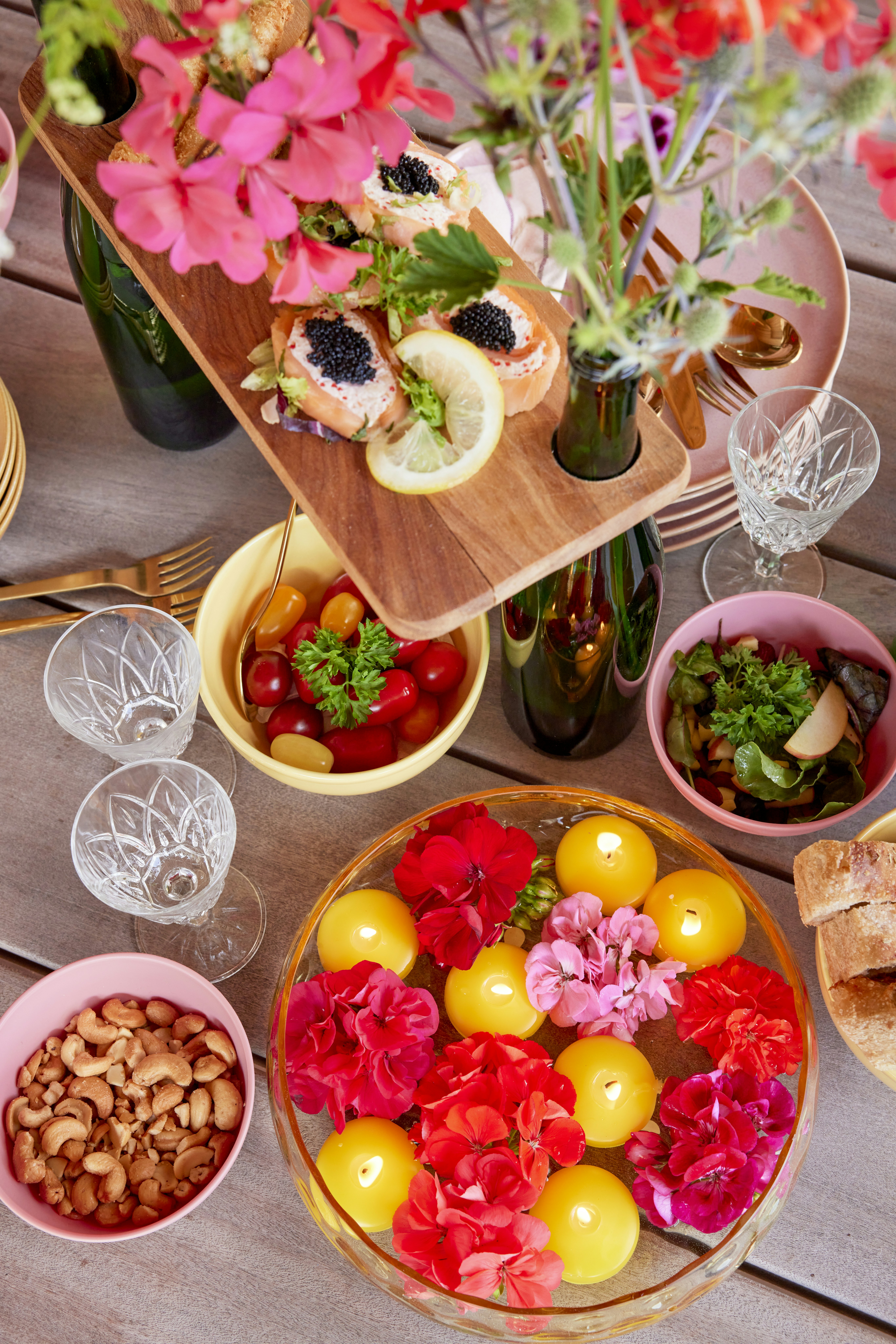 A beautiful spread of food and flowers.
