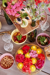 A beautiful spread of food and flowers.
