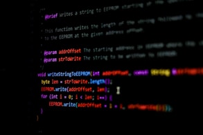 Code appears on a screen.