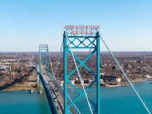 The ambassador bridge stretches across the detroit river.