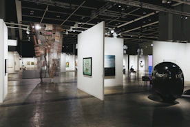 An art gallery showcases various paintings and sculptures.