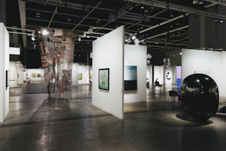 An art gallery showcases various paintings and sculptures.
