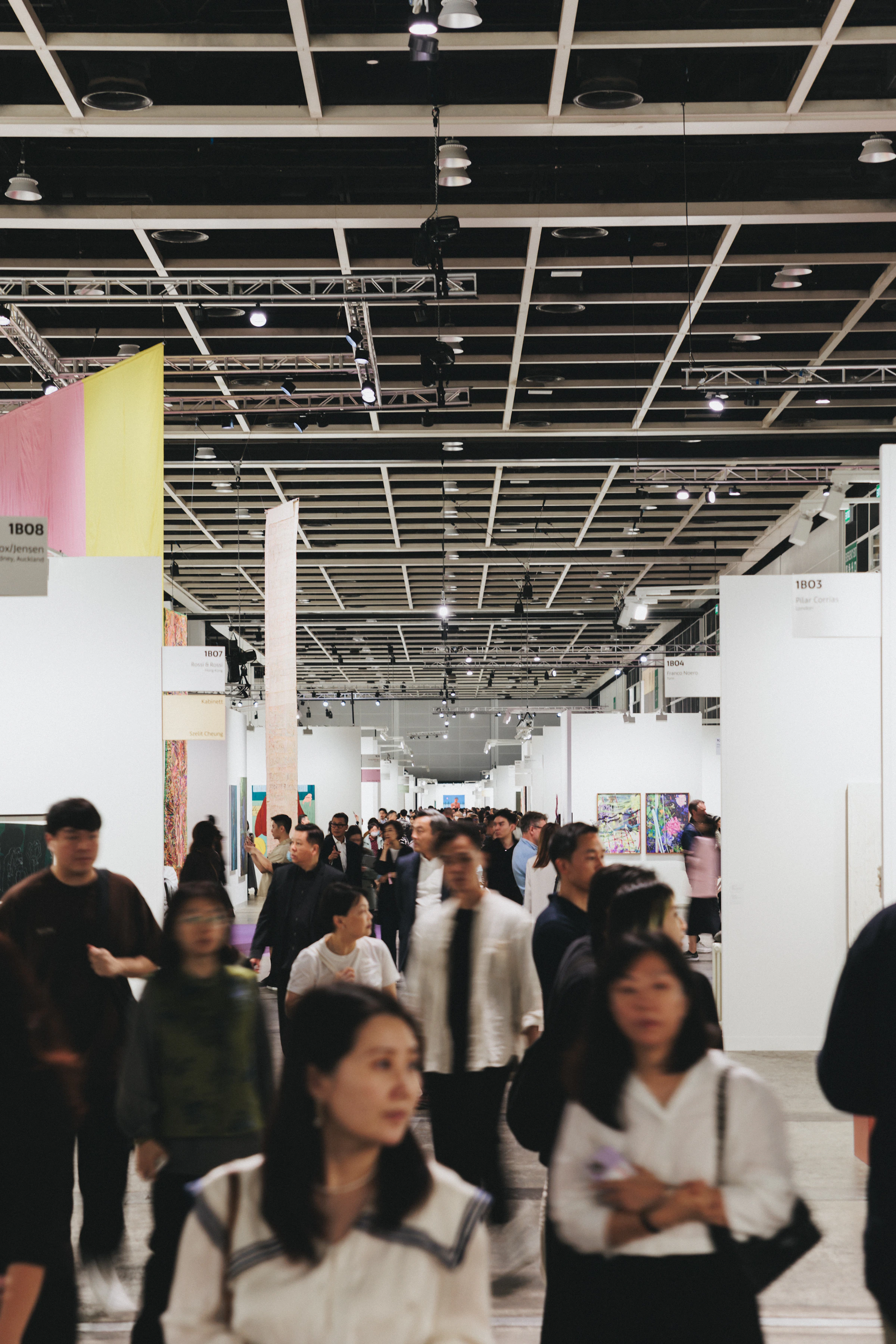 Visitors browsing a contemporary art fair in Hong Kong