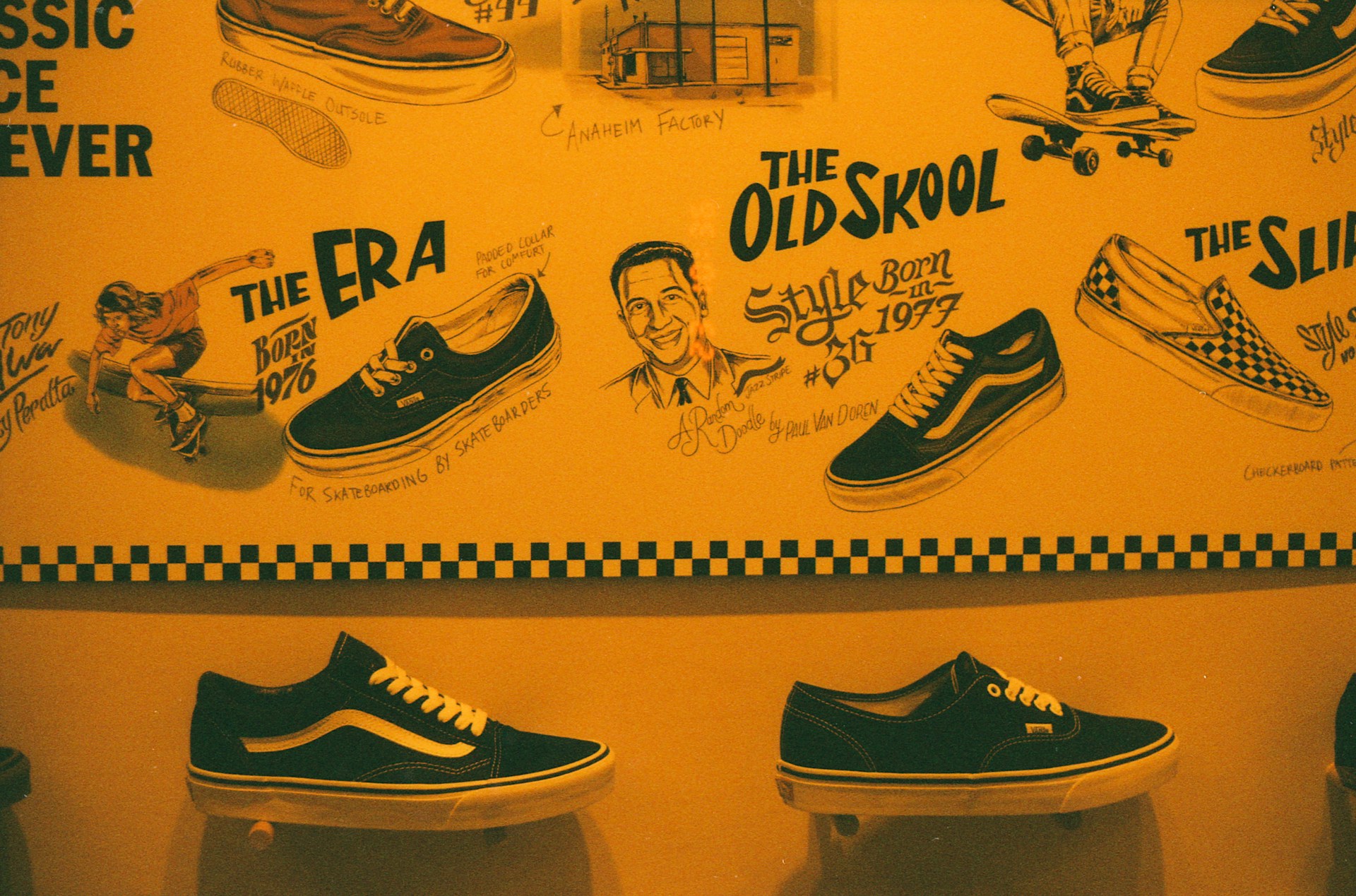 Vans sneakers are displayed with vintage-style graphics.