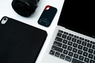 Electronic devices arranged on a white surface.