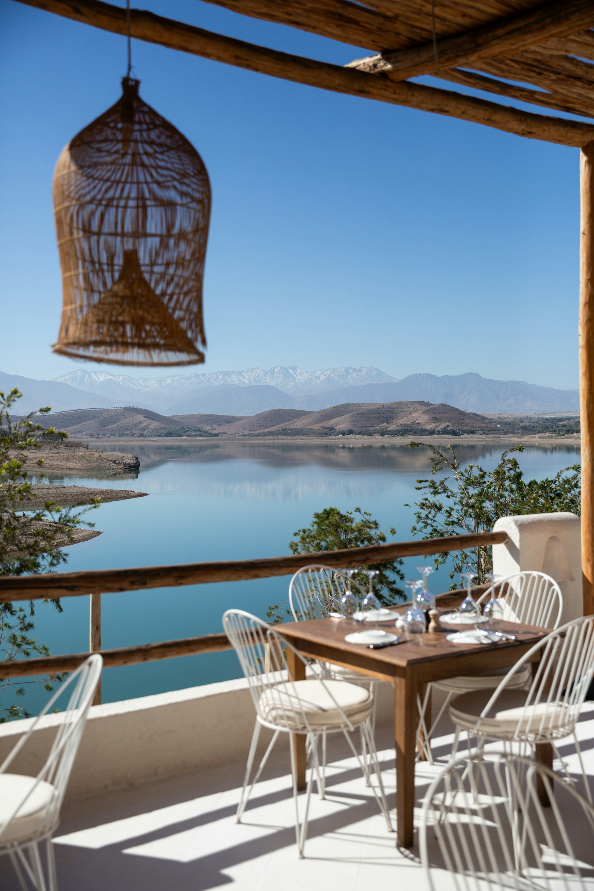 Dining with a beautiful view of lake and mountains.