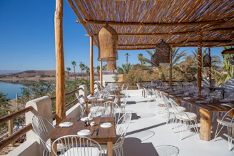 A restaurant with outdoor seating offers a nice view
