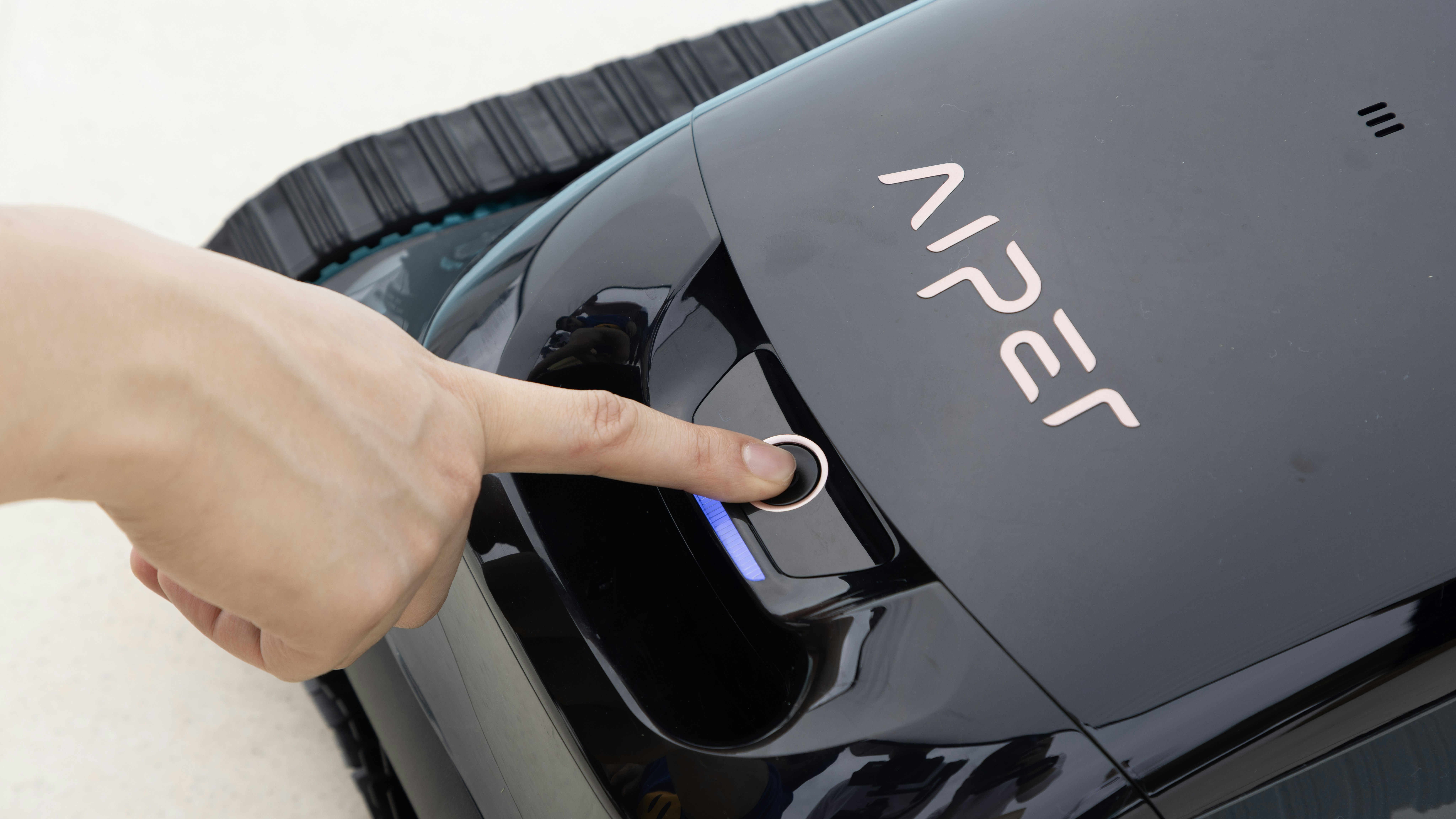 Technician reviewing electric vehicle battery diagnostics on a tablet