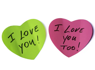 Two heart-shaped notes express love and affection