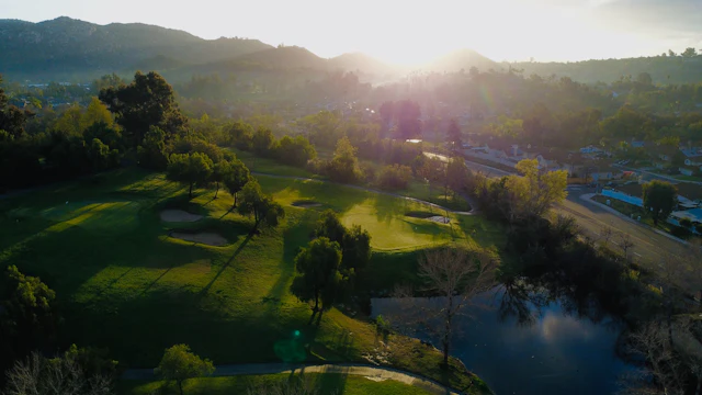Sunset over a lush golf course