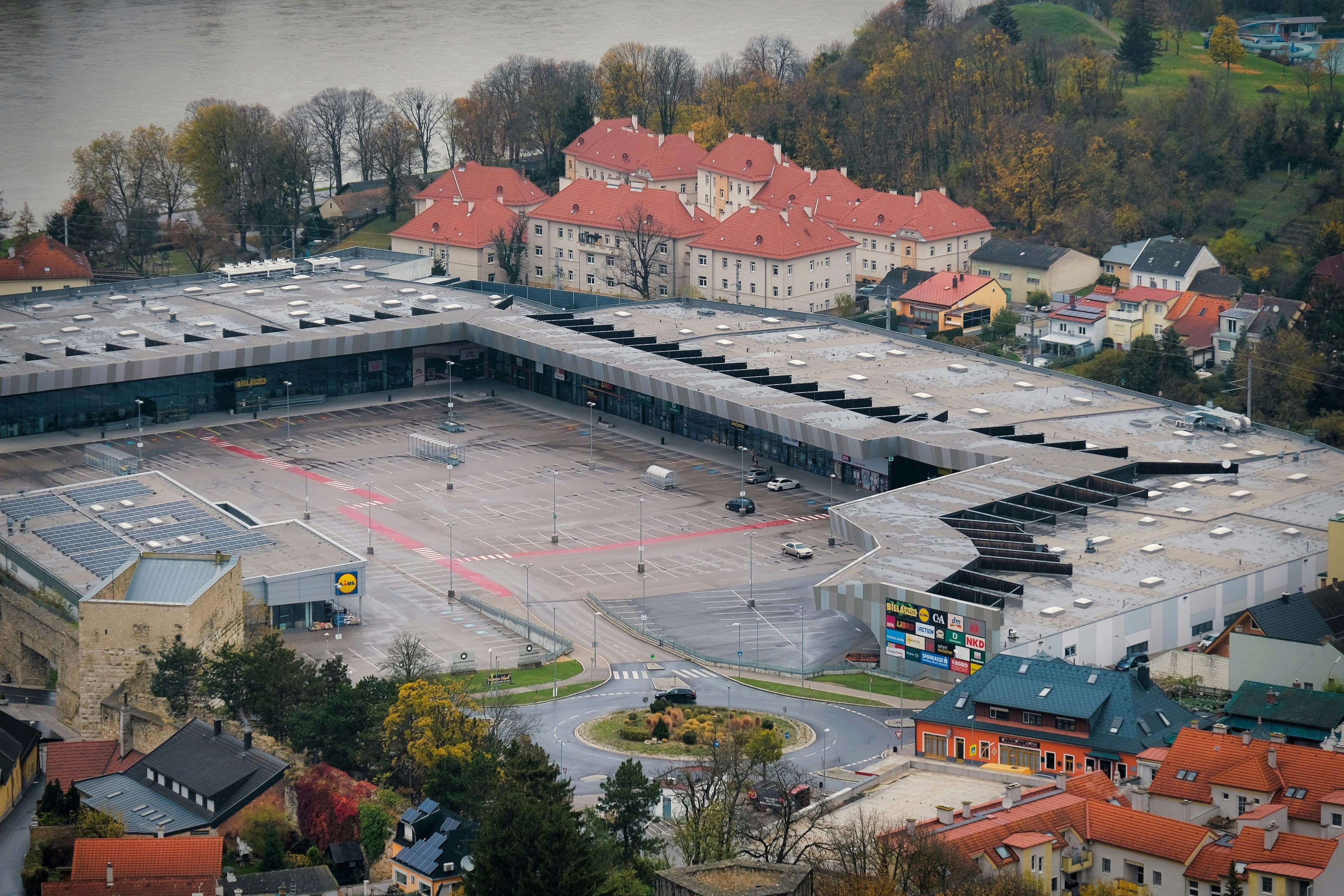 An aerial view of a shopping center.
