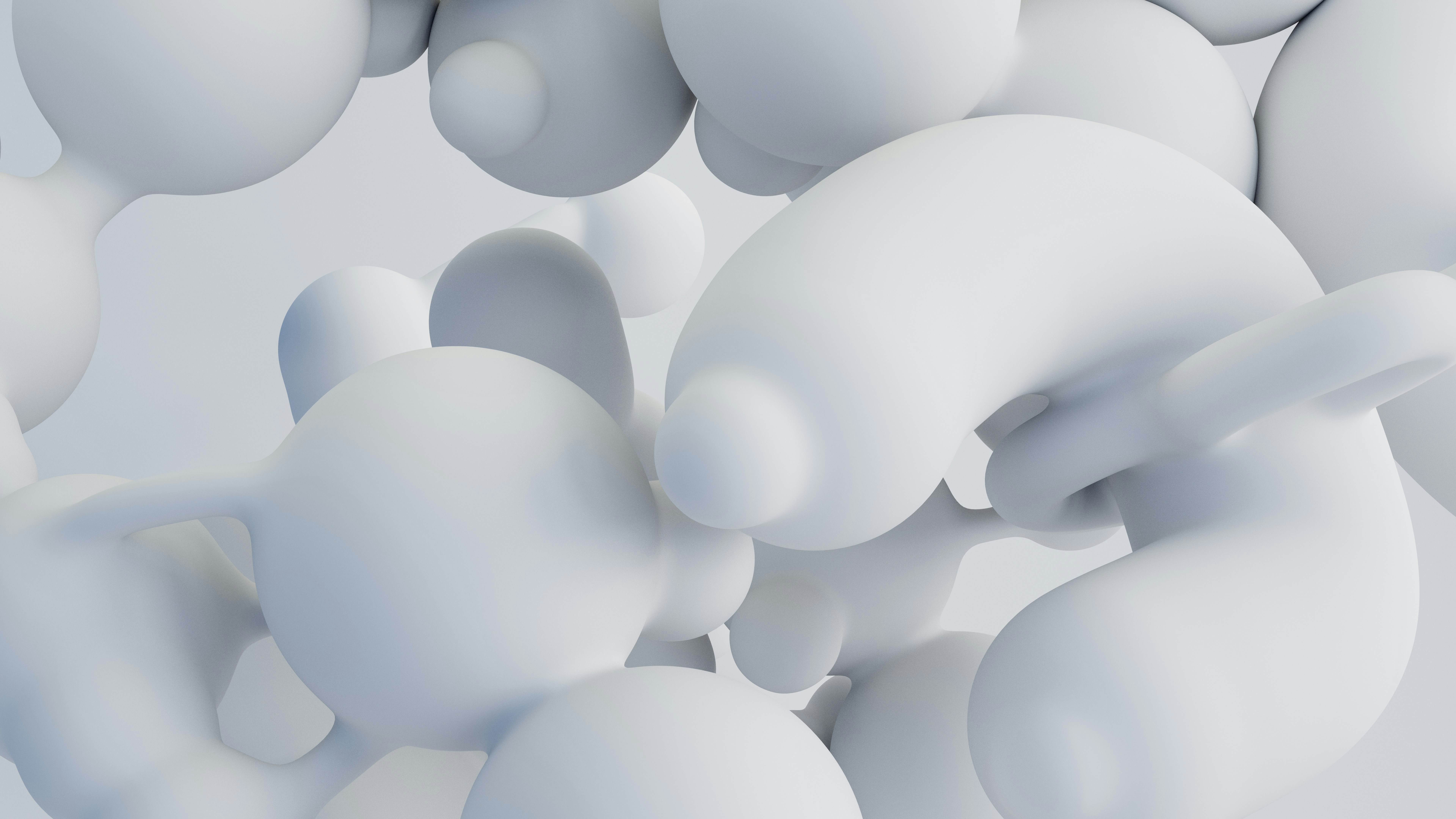 Abstract white shapes are clustered together.