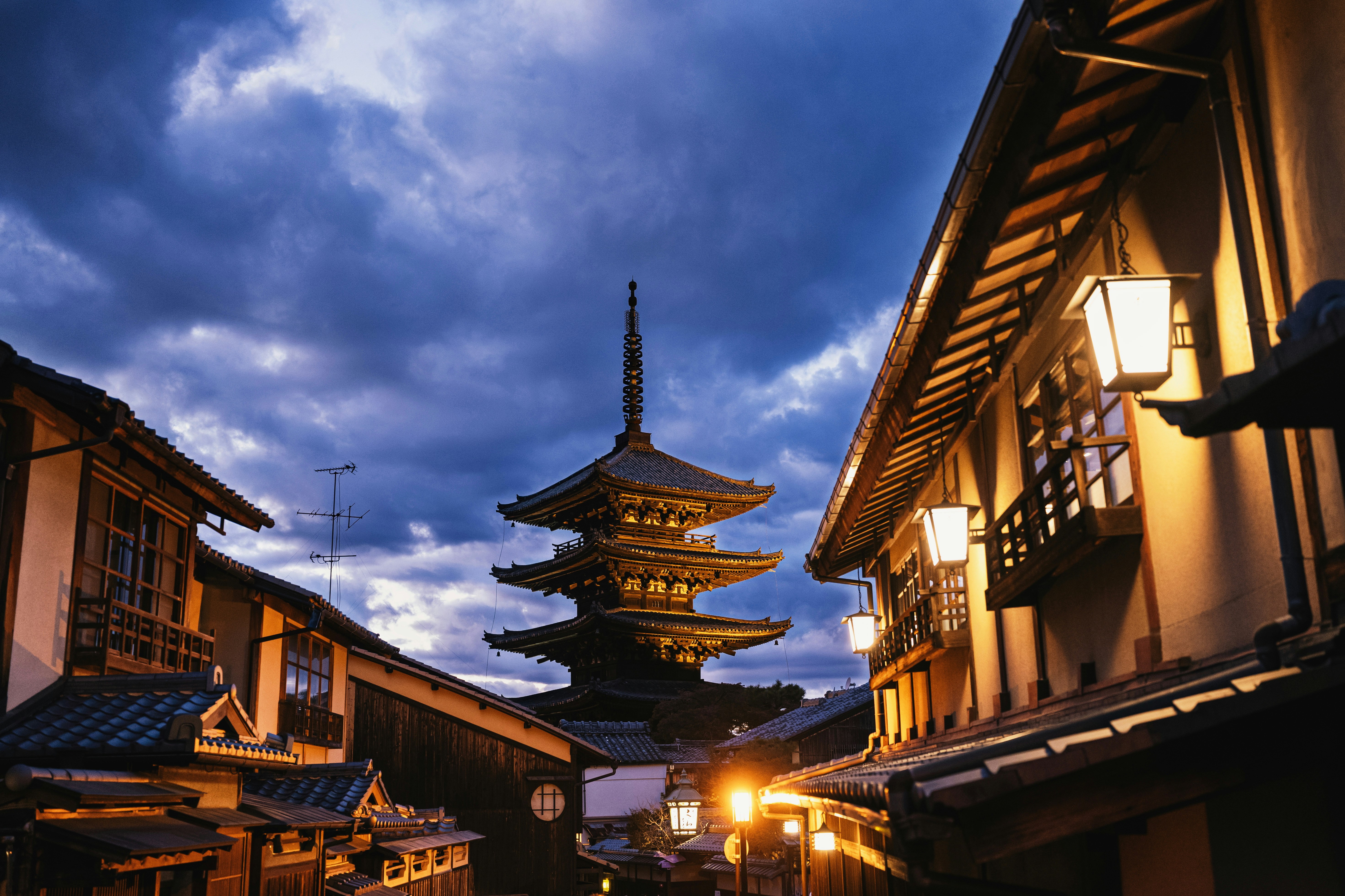 Night view of a japanese pagoda and street., 