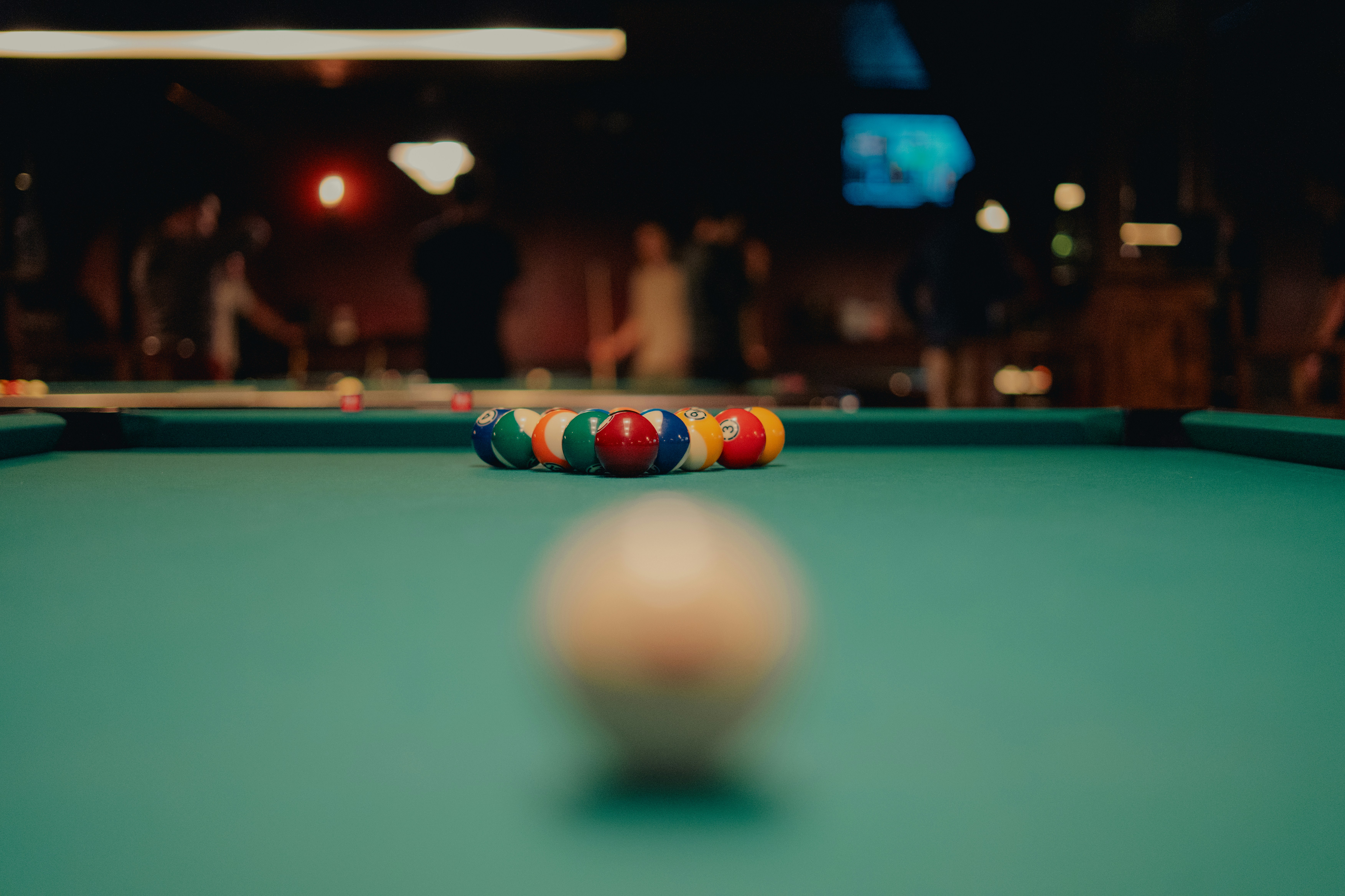 Pool table with a rack of colored balls. photo – Free Human Image on ...