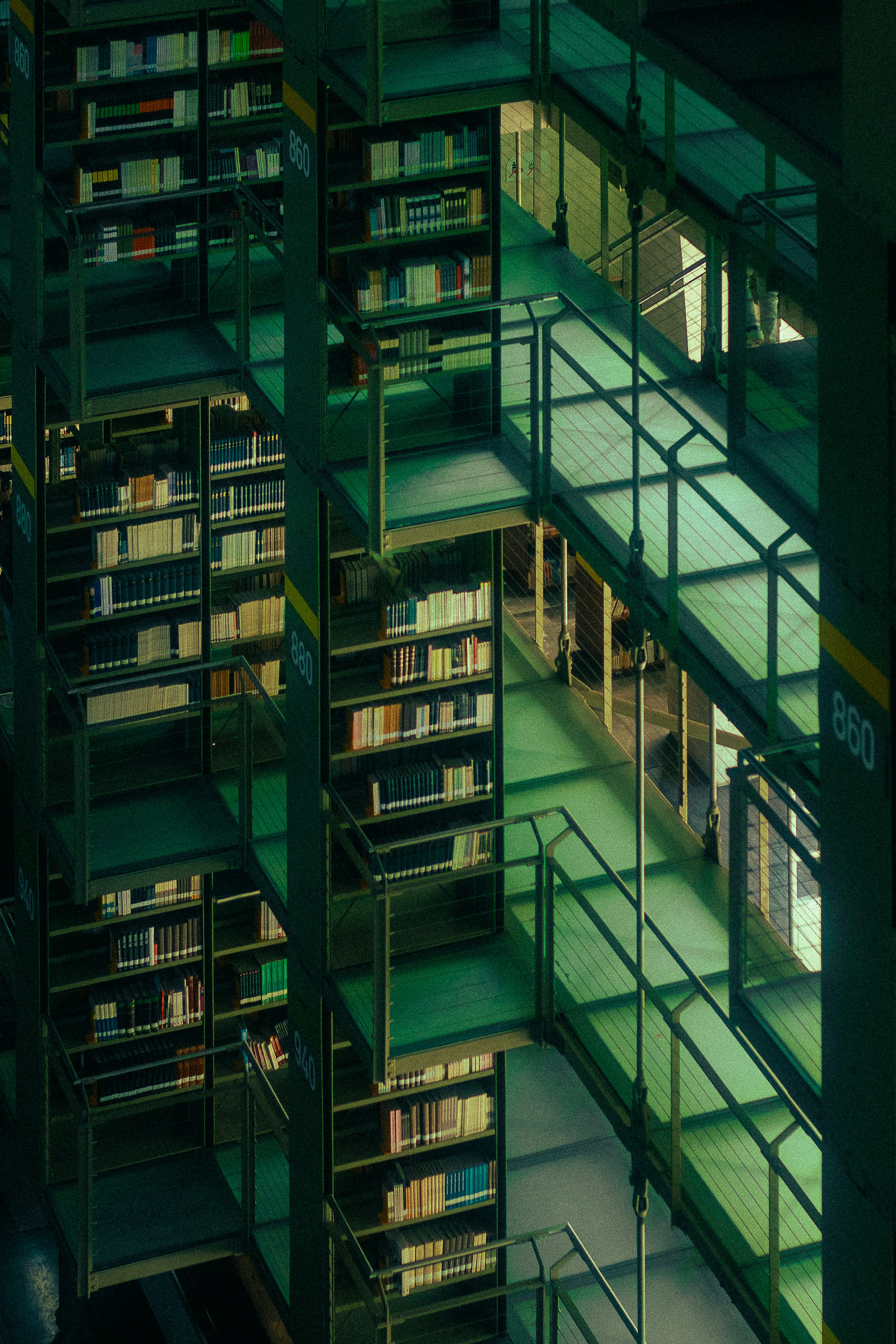 An impressive library with multiple shelves. photo – Free Background ...