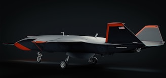 An unmanned aerial vehicle (uav) sits on a runway.