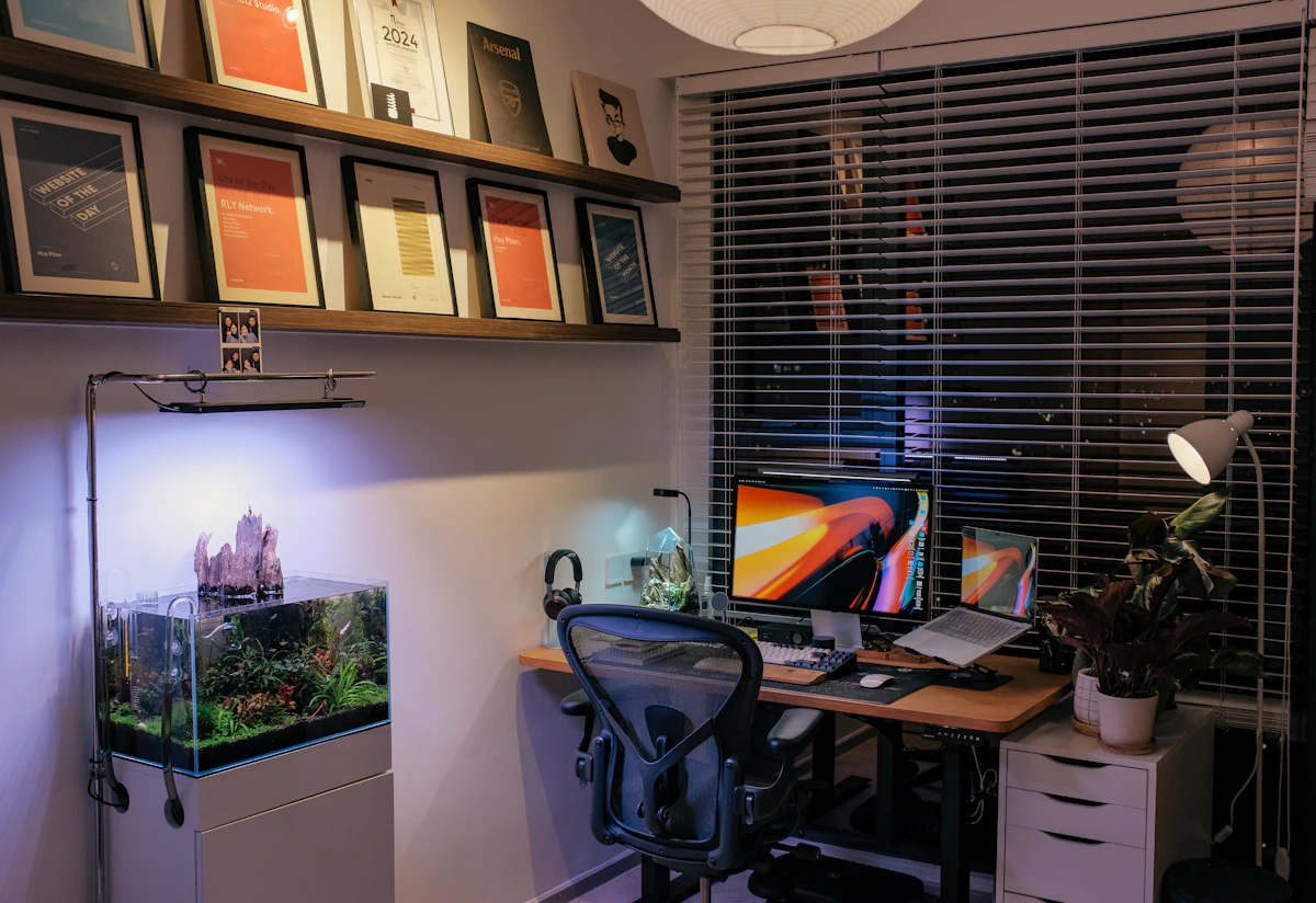 A cozy desk workspace beside a window