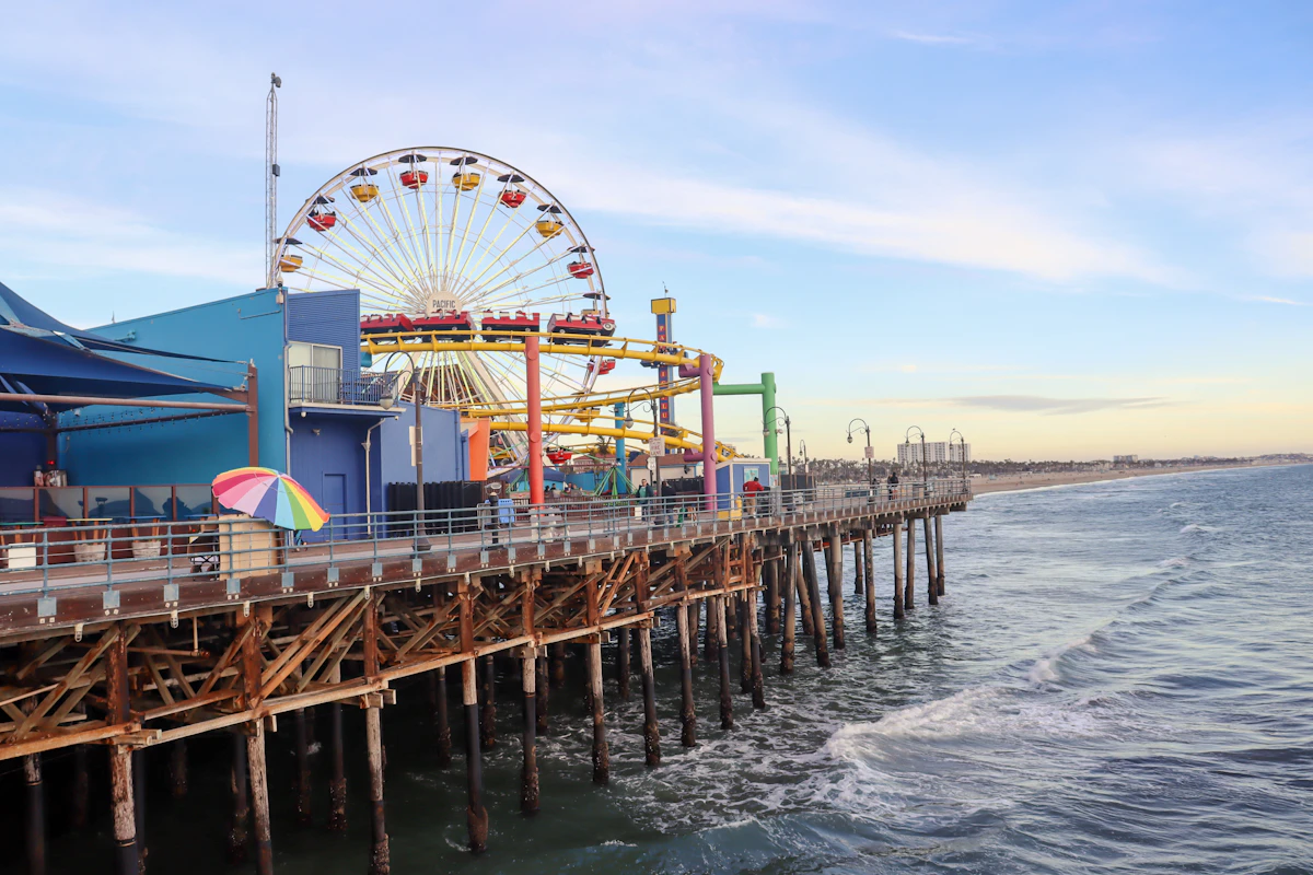 Santa Monica Pier with Pacific Park ferris wheel and ocean