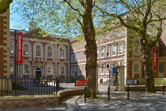 A beautiful, historic building with trees.