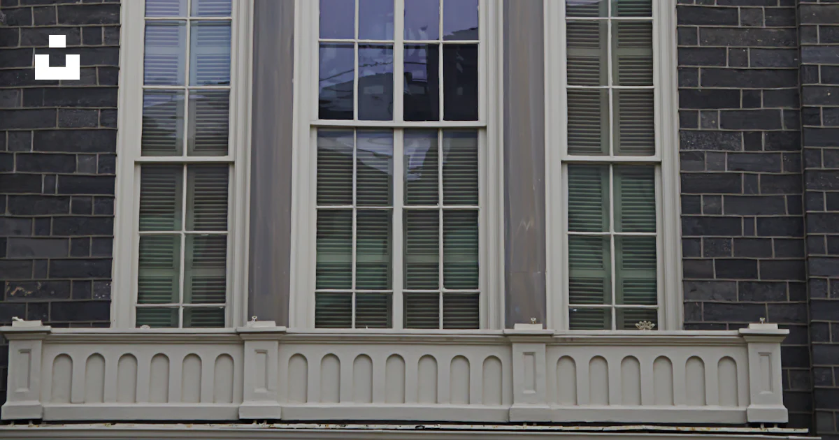 Unsplash Window Building's facade showcases windows and architectural details. photo ...