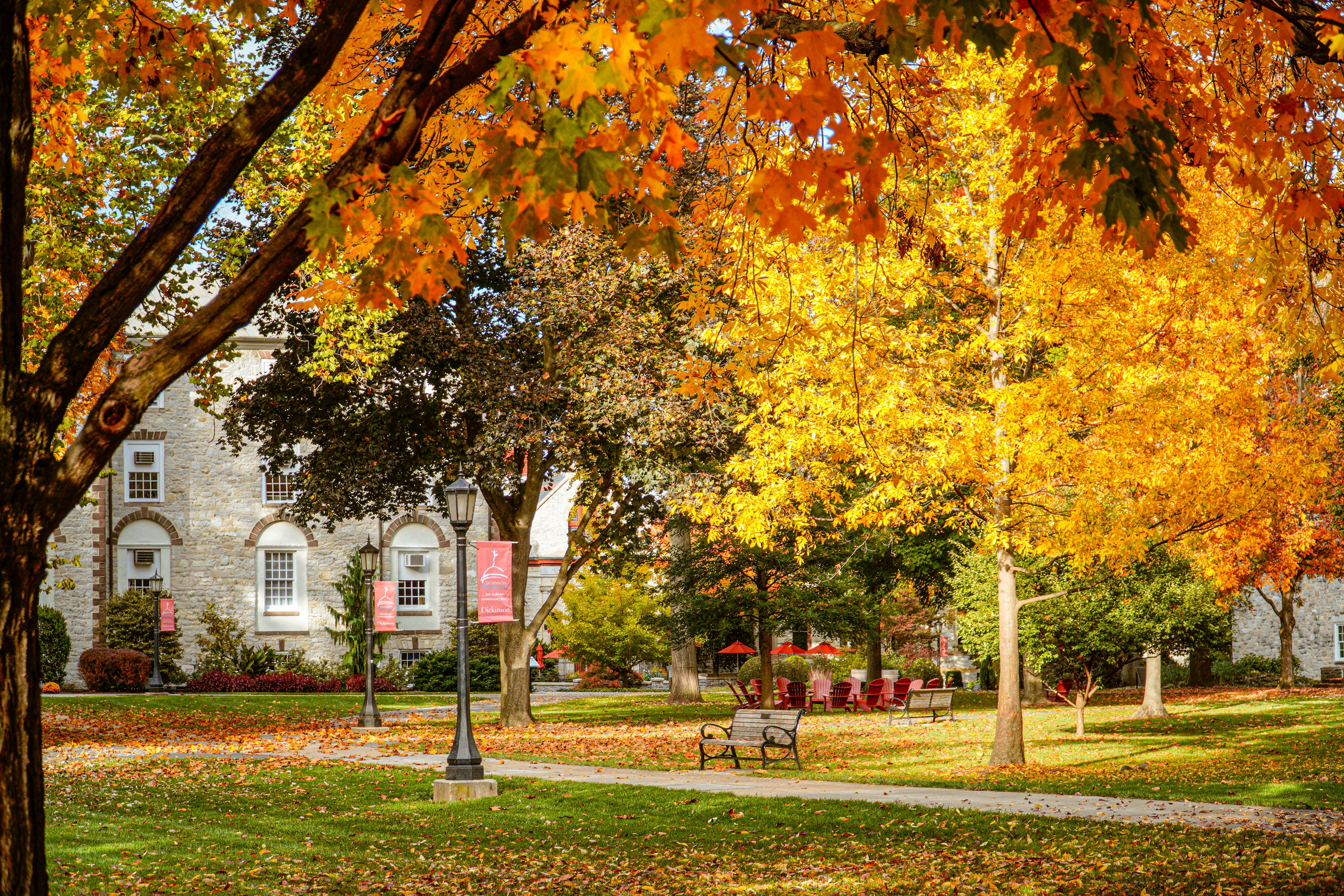 Autumn leaves frame a beautiful college campus.