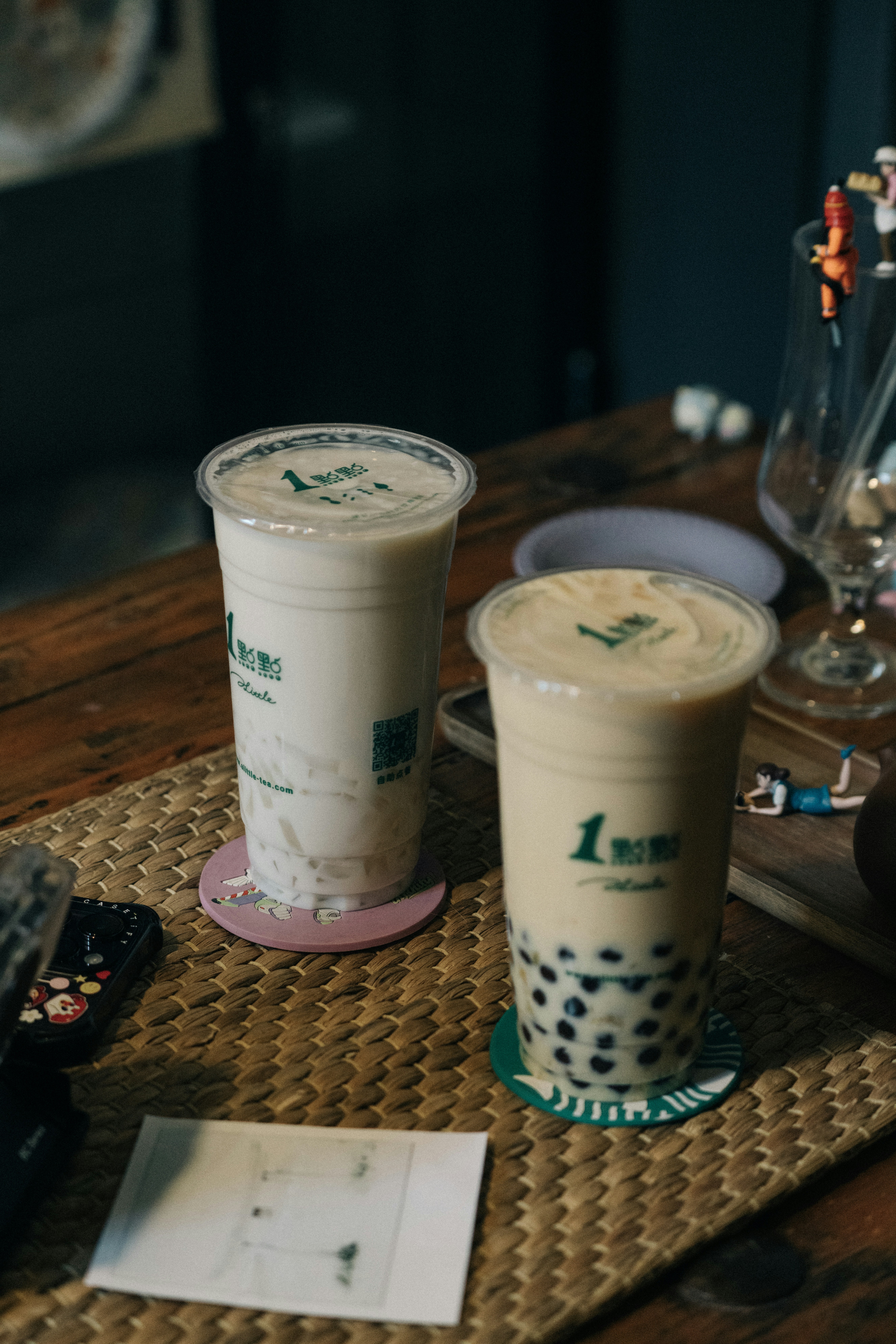 Two bubble tea drinks on a table