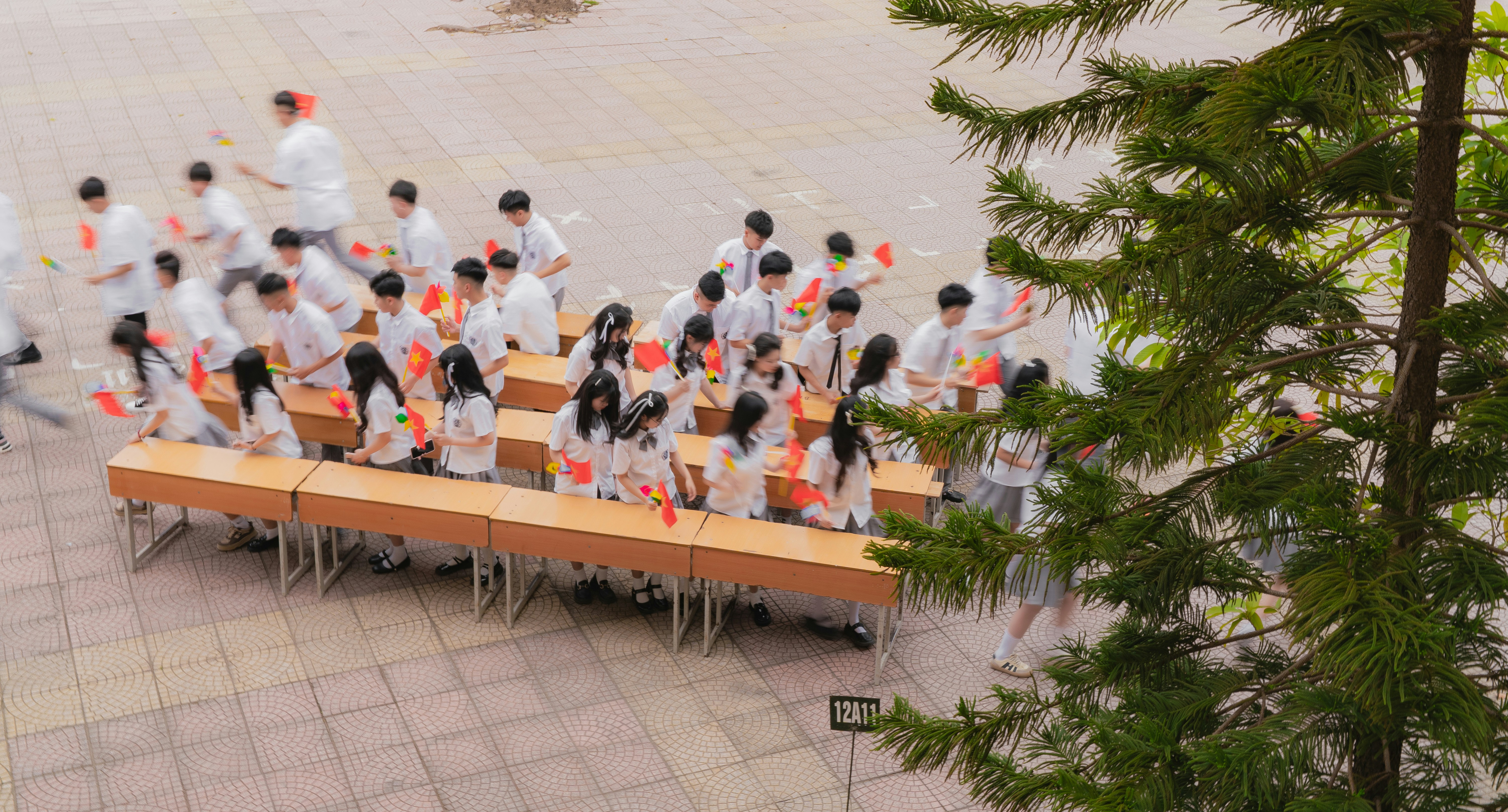 Students are having a celebration in the courtyard.