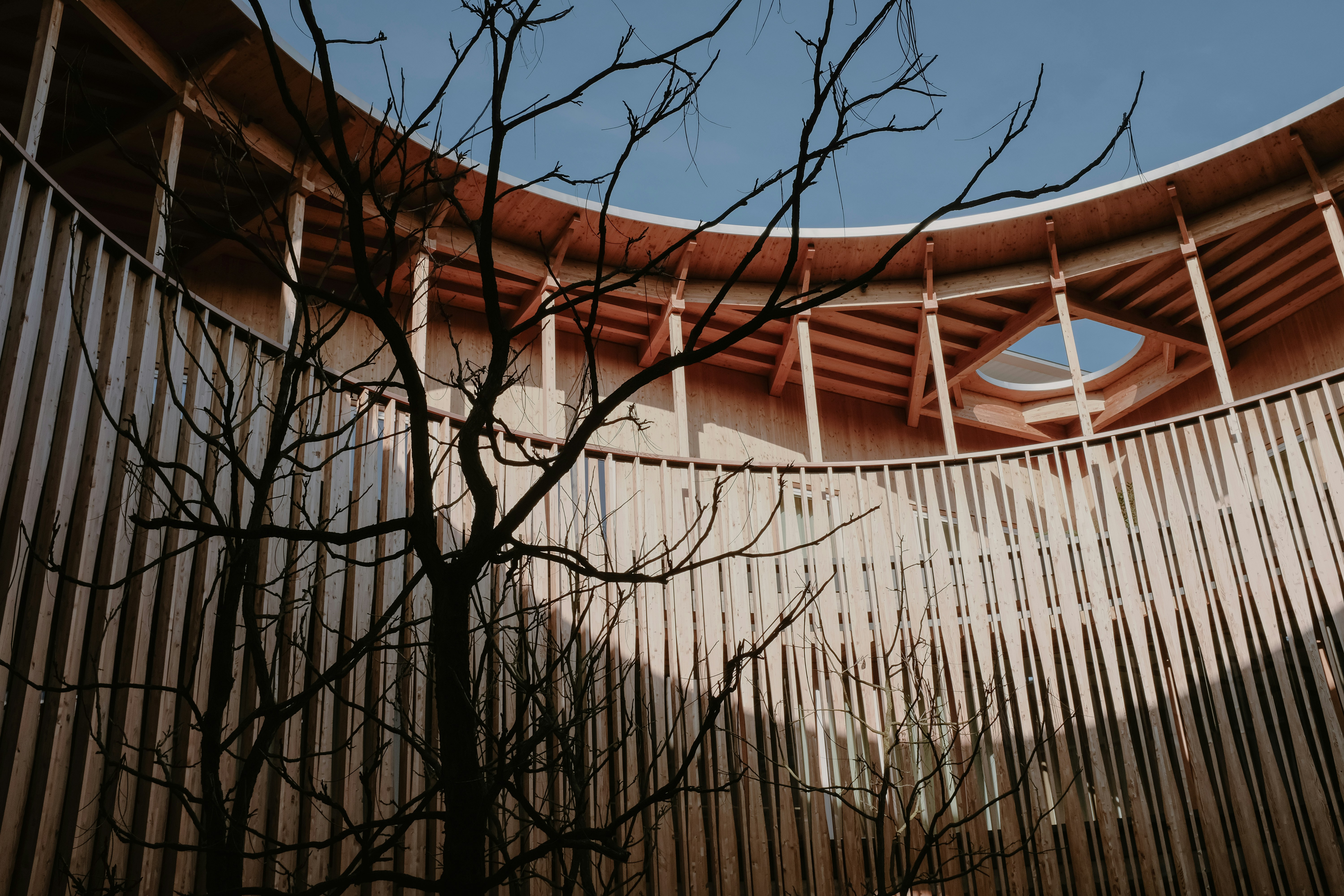 Inside a unique wooden building.