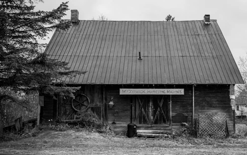 Old, rustic building with wooden walls.