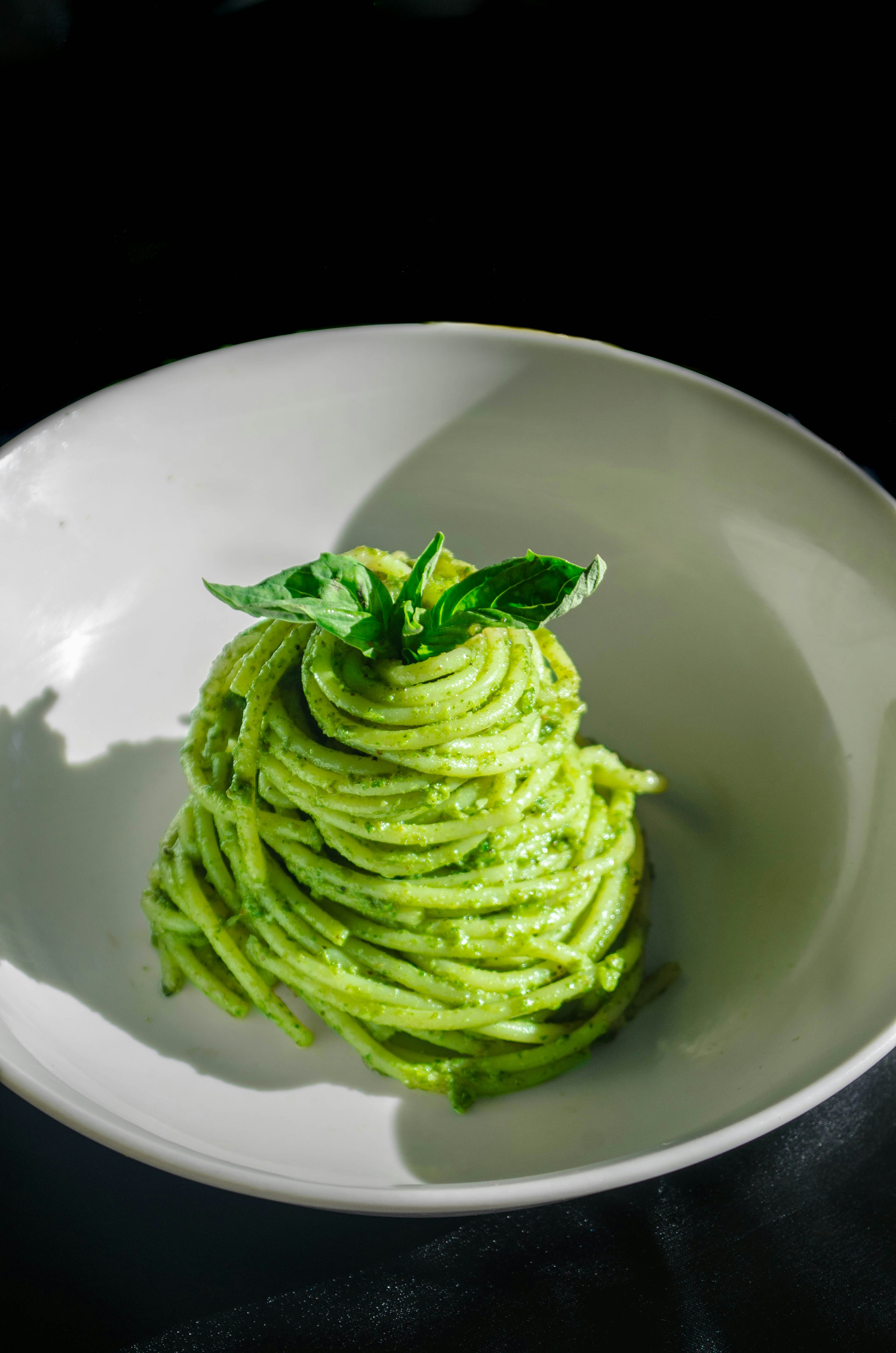 Delicious pesto pasta with fresh basil.